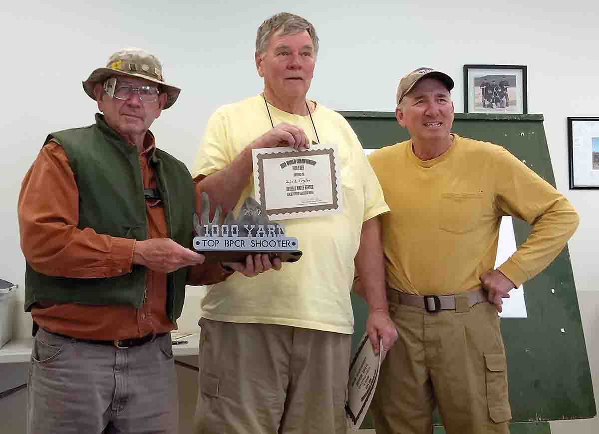 Left to right: Zack Taylor, winner of the World 1,000-Yard Match, Bill Loughridge, AZWINS, Tim Thorne, match director, World 1,000-Yard Match.